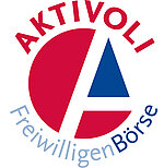Logo der Aktivoli-FreiwilligenBörse mit dem Schriftzug „AKTIVOLI“ in Rot und „FreiwilligenBörse“ in Grau. In der Mitte befindet sich ein stilisiertes Symbol aus roten und blauen Flächen.